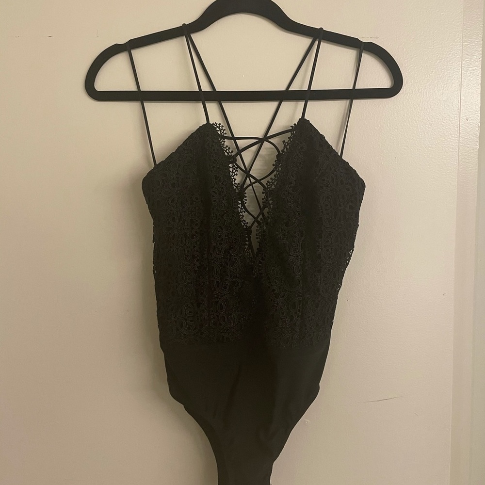 Sexy black lace appliqué body suit! Worn once!